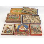 6 alte Kinderpiele.England, USA und Frankreich, um 1900-1960. Pappe, Papier, Holz, farbigbedruckt.