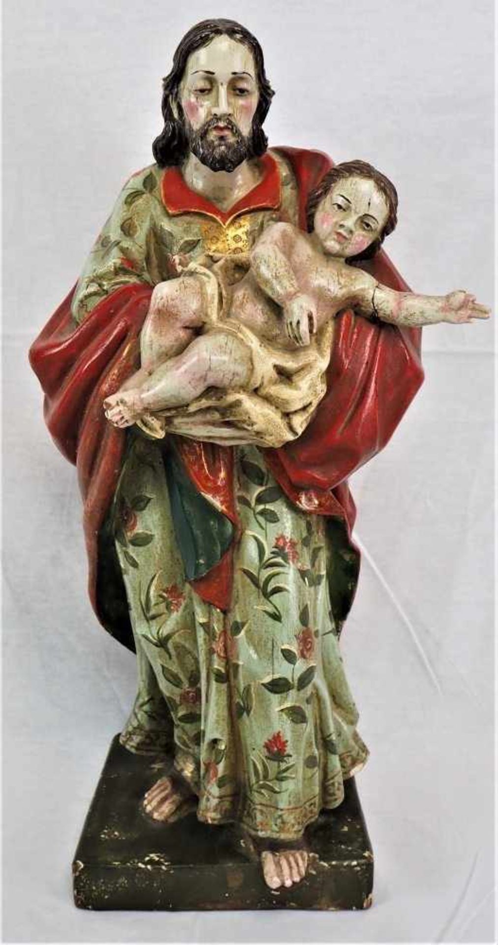 Heiliger Josef mit Jesuskind, wohl 18.Jh.Lindenholz vollplastisch geschnitzt, Fassung polychrom