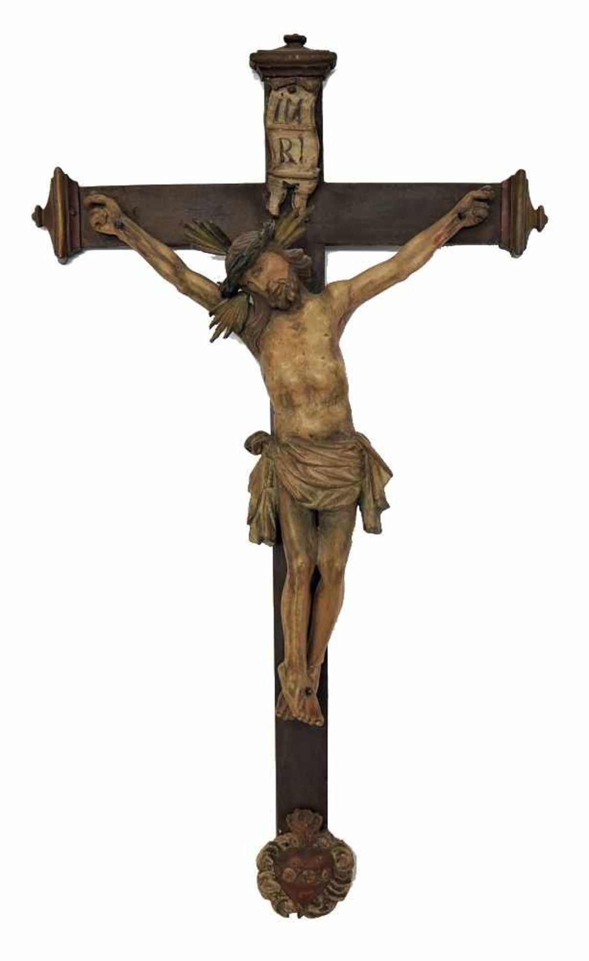 Kruzifix süddeutsch, wohl mitte 18. Jh.Holzkreuz gefasst und dunkel lasiert, profilierte Enden.