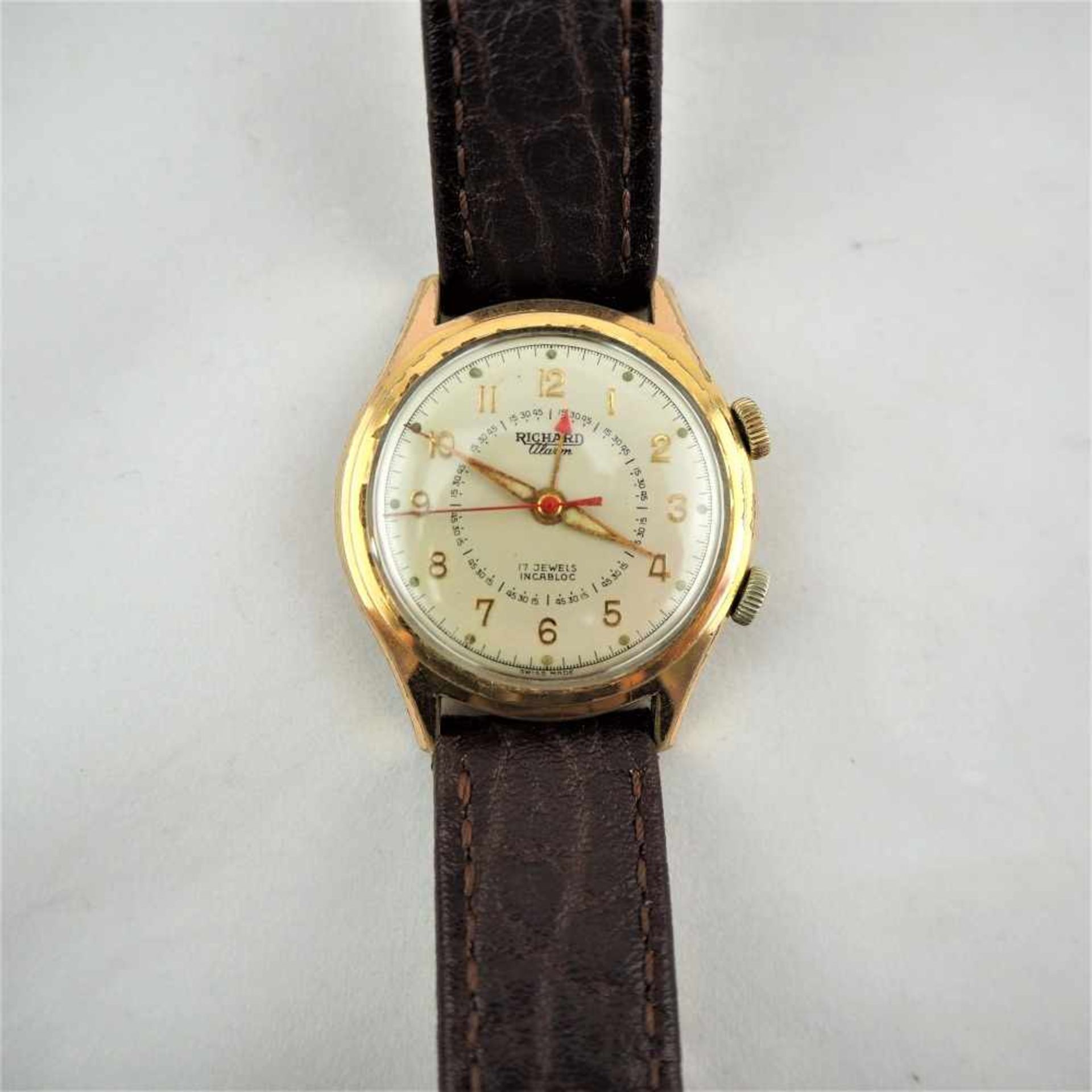Herrenarmbanduhr mit Wecker, 50er JahreSeltene Uhr mit Wecker und Zentralsekunde. Gehäuse aus Stahl,