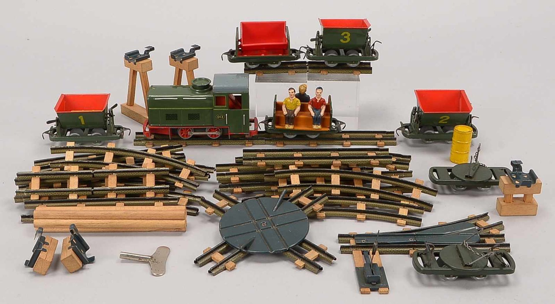 Modelleisenbahn-Konvolut, 1950er Jahre, 'Bing', Blech, umfassend: Lok, Loren und Personenwagen; dazu