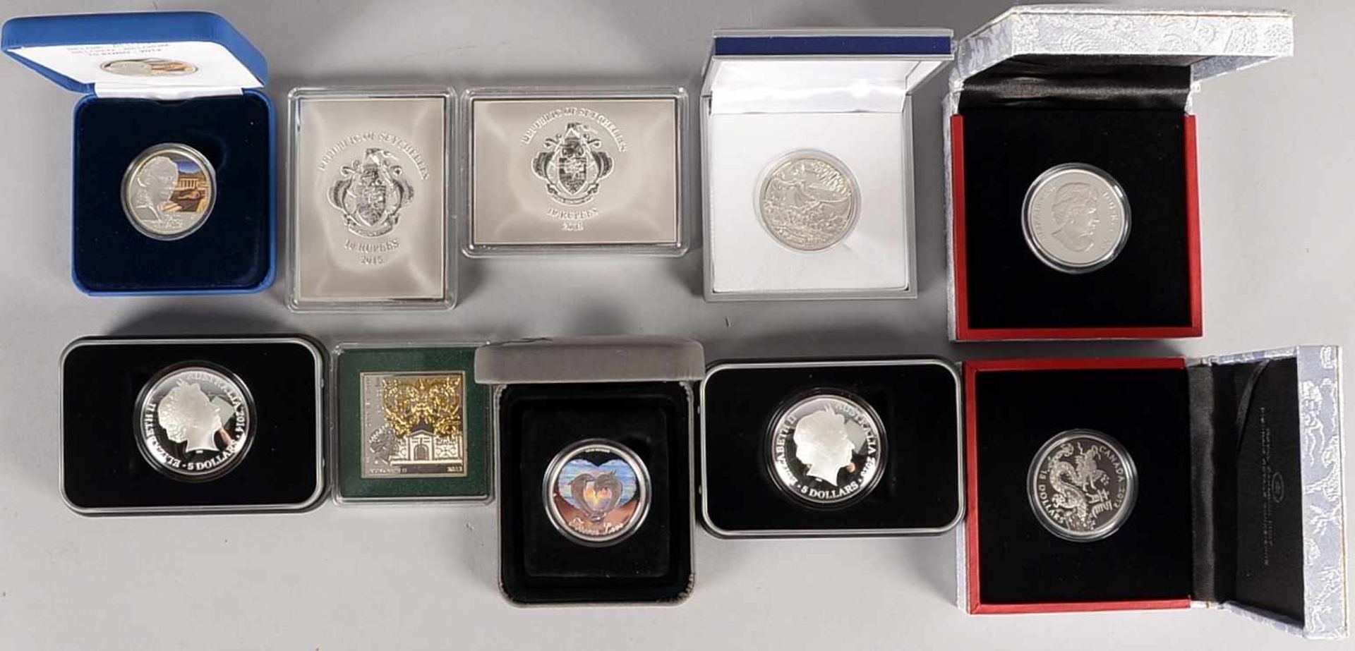 Interessantes Silbermünzen-Konvolut, 10 Stück, u.a.: '10 Rupees'/Seychellen, '2 Dollars'/Republik