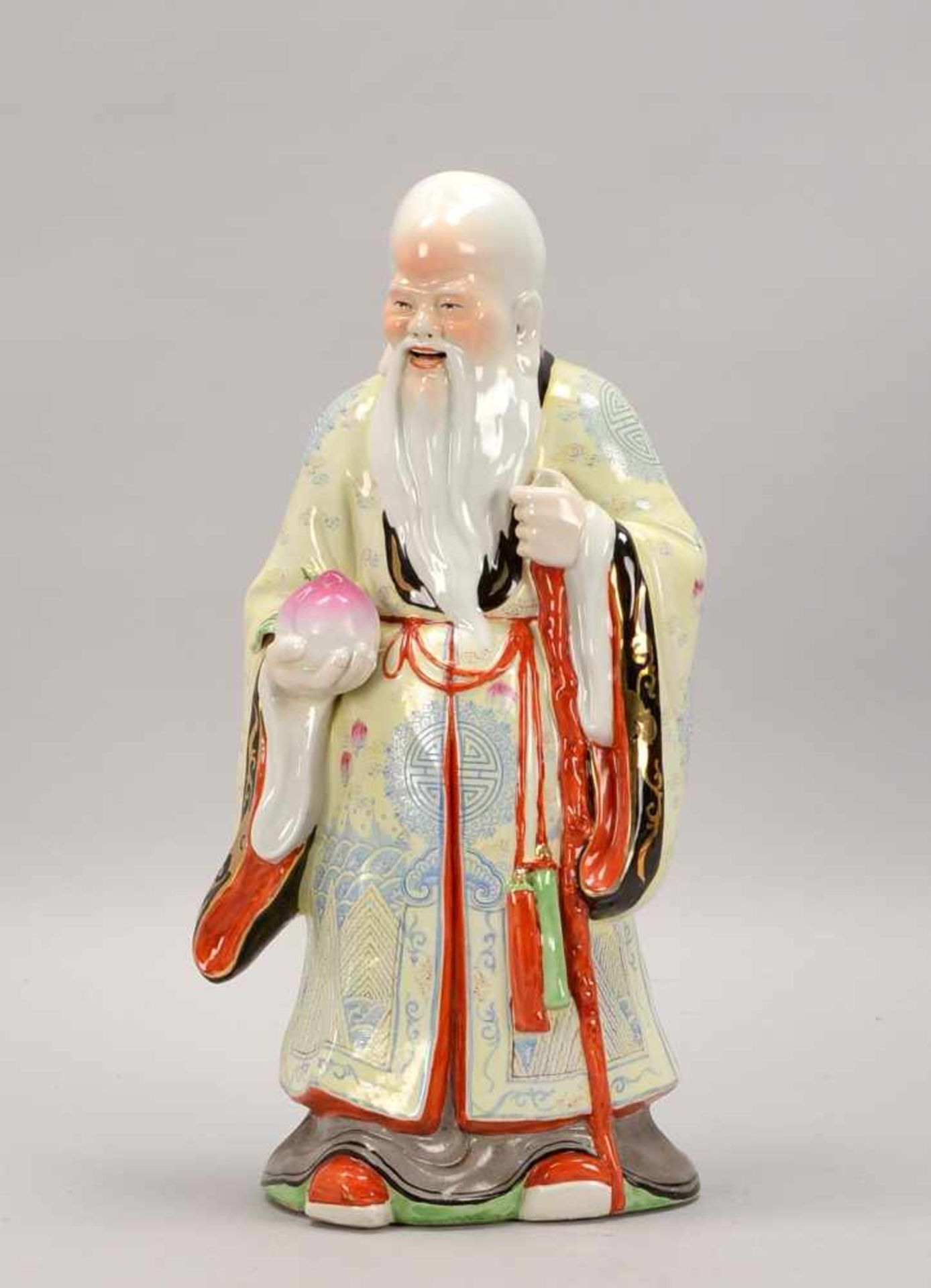 Porzellanfigur, China, 'Chinesischer Weiser' (Glück symbolisierend), farbig gefasst, partiell