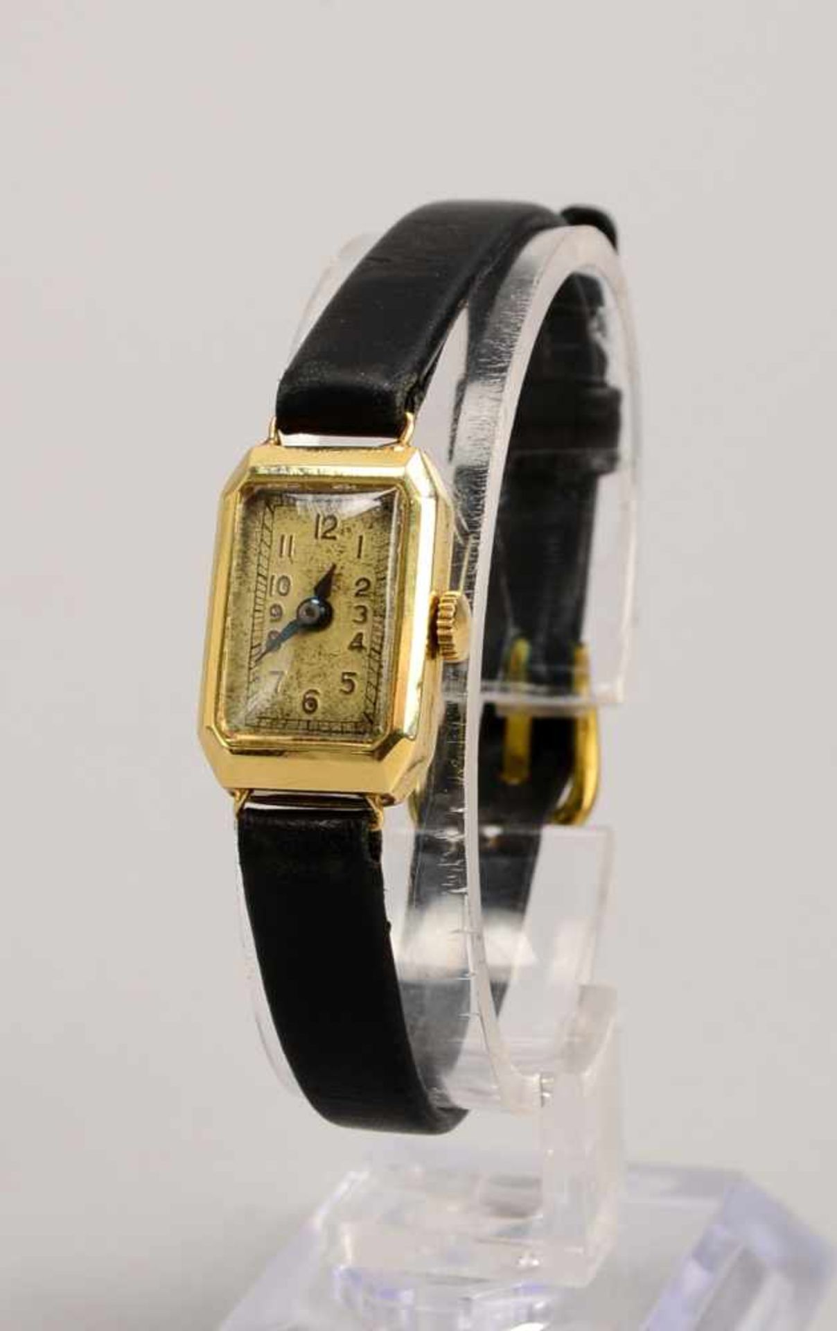 Damen-Armbanduhr, 585 GG, rechteckiges Gehäuse, Uhr läuft an, an schwarzem Lederarmband; Maße
