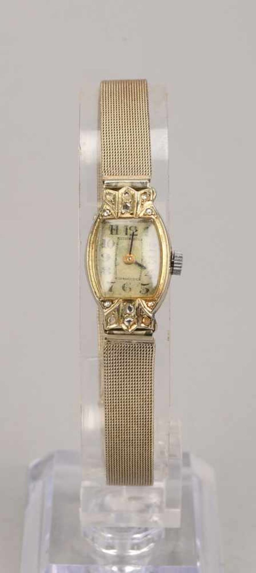 Damen-Armbanduhr, Art déco, 750 WG-Gehäuse, besetzt mit kleinen Diamantrosen, an 585 WG-Armband/