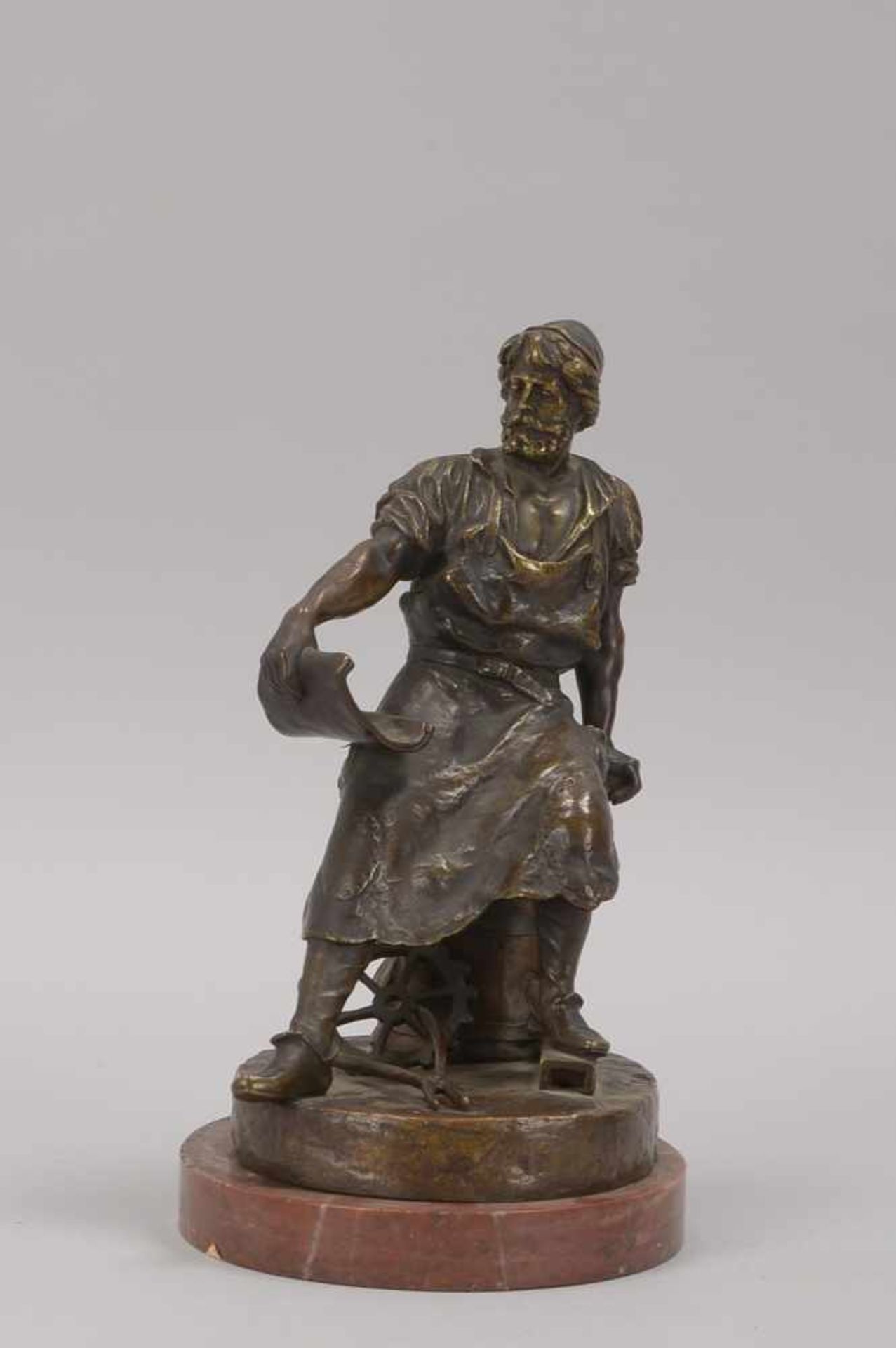 Bronzeskulptur, 'Schmied', im Stand signiert 'René Gewso', Figur auf ovalem Stand/auf