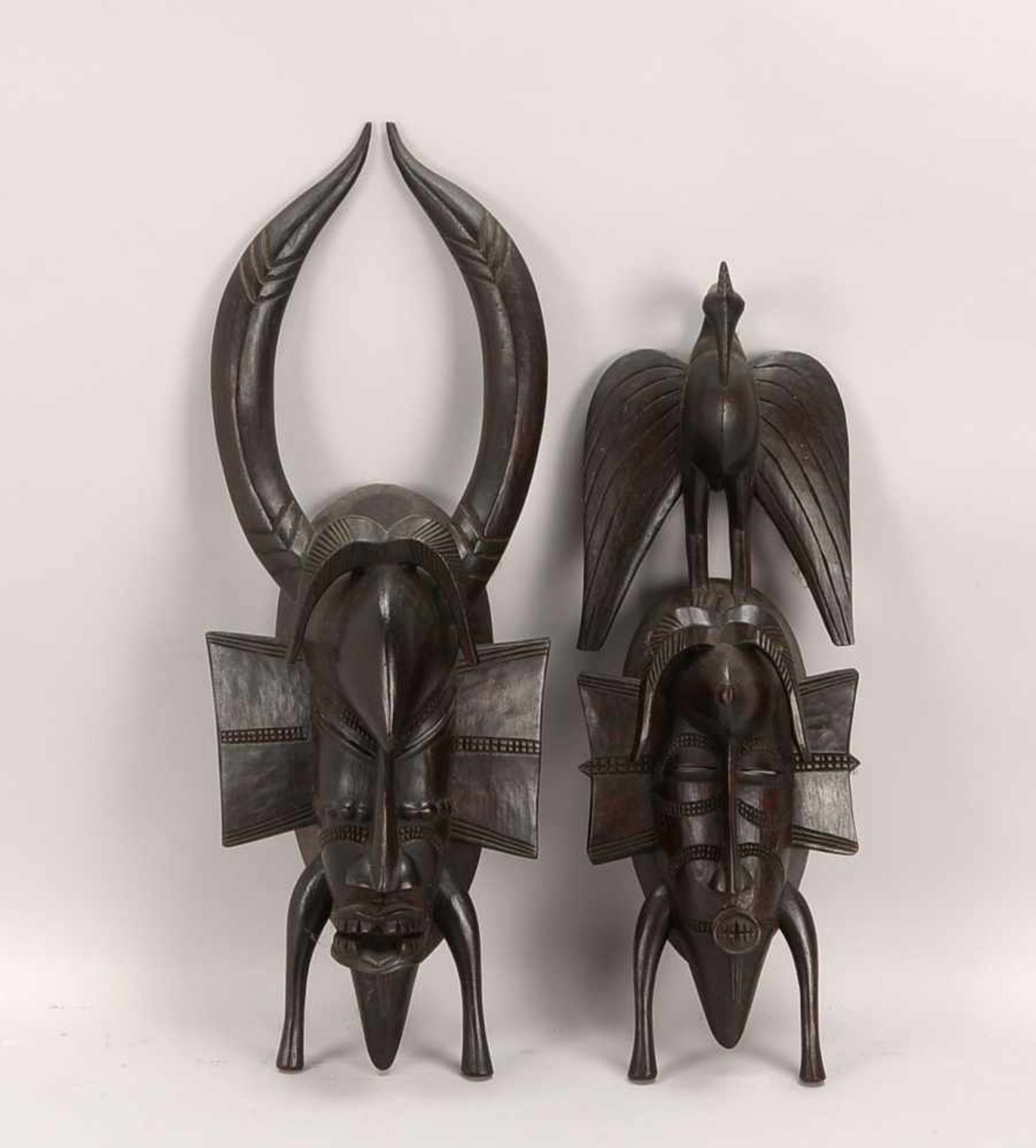 2 Holzmasken, Senegal/Afrika; 1x Höhe 55 cm, und 1x Höhe 45 cm