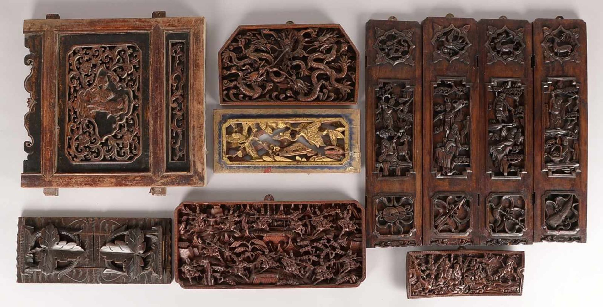 Konvolut Holzschnitzereien, China, verschiedene Motive und Hölzer, 9 Stück, verschiedene Maße -