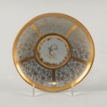 GERMAN PORCELAIN SAUCER MONOGRAMMED, DECORATED IN GILT