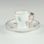 GILT AND FLORAL TINY TEACUP AND SAUCER DEMITASSE SET