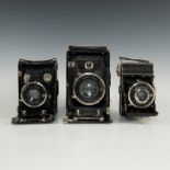 GROUP OF 3 VINTAGE ZEISS IKON FOLDING CAMERAS