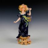 E. AND A. MULLER PORCELAIN FIGURE