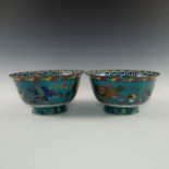 PAIR OF LARGE CHINESE CLOISONNE BOWL, FU DOGS AND DRAGONS WITH FLORA