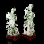 PAIR OF CARVED JADE GUANYIN, WITH WOODEN STANDS