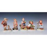 GROUPING OF HUMMEL FIGURINES