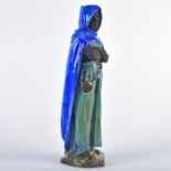 ROYAL DOULTON FIGURE, AN ARAB BY CHARLES NOKE, HN33