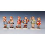 GROUPING OF HUMMEL FIGURINES