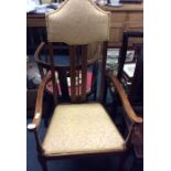 An inlaid bedroom chair.