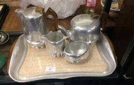 A good four piece tea and coffee set on tray.