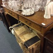 A good mahogany two drawer desk.