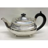 A good Georgian silver teapot with hinged top to b