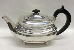 A good Georgian silver teapot with hinged top to b
