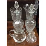 A good pair of glass decanters, vases, etc.