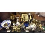 A collection of brass ware and plated ware.