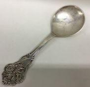 A large Continental pierced spoon decorated with s