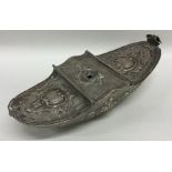 An unusual Italian silver boat shaped box embossed