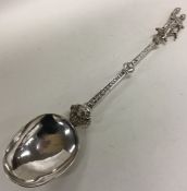 A heavy Continental silver spoon decorated with a