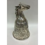 An unusual Continental silver stirrup cup profusel