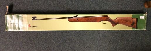 A boxed air rifle.