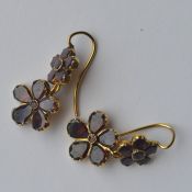 A pair of Antique garnet flower shaped cluster ear