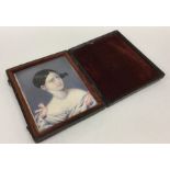 An attractive rectangular painting of a lady in le