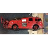 A tin plate model of a fire engine.