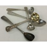 A collection of various silver cruet spoons. Appro