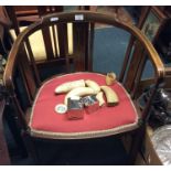 An inlaid bow back chair.