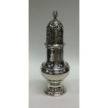 A large George II sugar caster with pierced lid. L