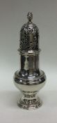 A large George II sugar caster with pierced lid. L