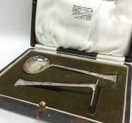 A cased silver pusher and spoon. Sheffield. Approx