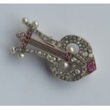 A French pearl, ruby and diamond brooch in the for