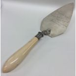 A large silver and ivory presentation trowel. Exet