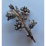 A large French brooch in the form of a flower with