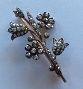 A large French brooch in the form of a flower with