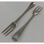 Two good silver three prong Georgian forks. Approx