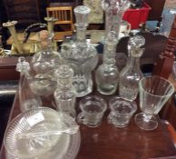 Good glass decanters, vases, etc.