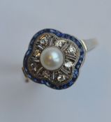 A French diamond and sapphire cocktail ring in 18