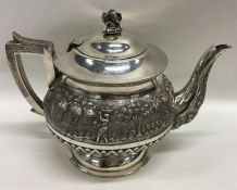 A heavy Indian silver teapot, the body attractivel