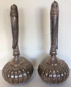 A pair of massive Islamic silver bottles of balust